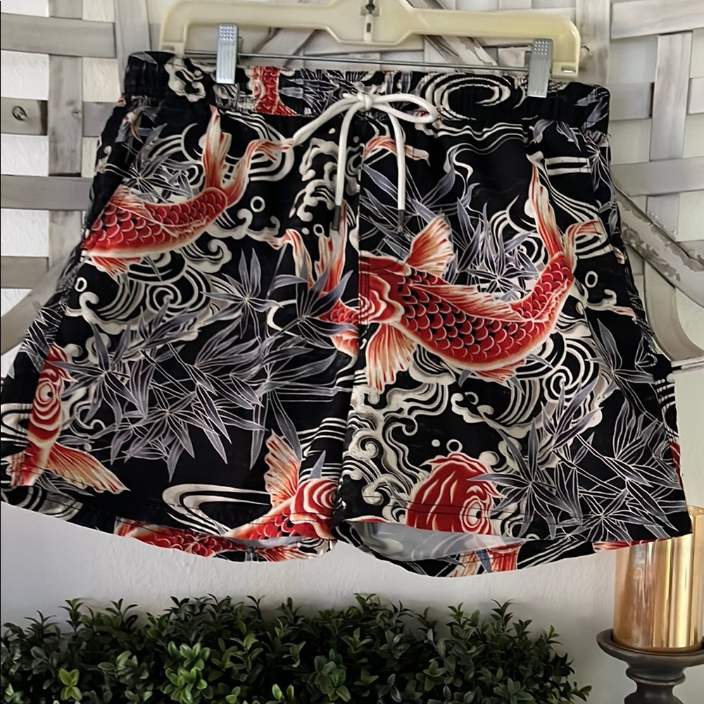 Dynamic Black and Red Board Shorts for Swimming